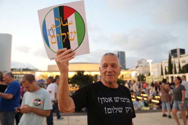 Protest against government in Tel Aviv TEL AVIV, ISRAEL - JUNE 27: People stage a protest against Prime Minister Benjamin Netanyahu and the current government as they gather in Habima Square in Tel Aviv, Israel on June 27, 2026. Protestors, calling on Israel to end its attacks on Gaza and Lebanon, carried placards criticizing the government’s war policies and the compulsory military service imposed on Ultra-Orthodox (Haredi) Jews. Gideon Markowicz Anadolu Tel Aviv Israel. Editorial use only. Please get in touch for any other usage.  Copyright: x2026xAnadoluxGideonxMarkowiczx