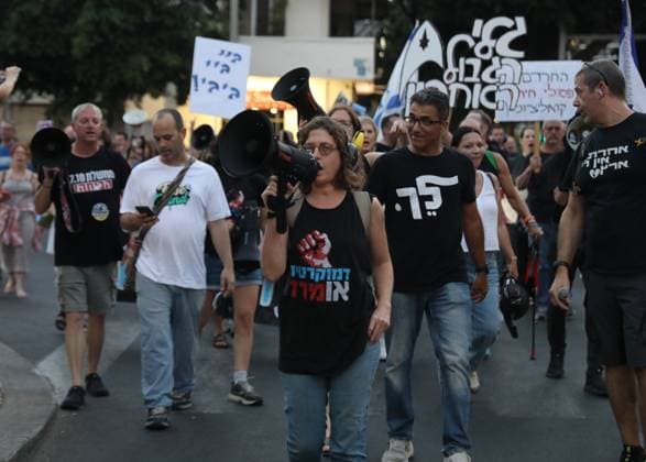 Protest against government in Tel Aviv TEL AVIV, ISRAEL - JUNE 27: People stage a protest against Prime Minister Benjamin Netanyahu and the current government as they gather in Habima Square in Tel Aviv, Israel on June 27, 2026. Protestors, calling on Israel to end its attacks on Gaza and Lebanon, carried placards criticizing the government’s war policies and the compulsory military service imposed on Ultra-Orthodox (Haredi) Jews. Gideon Markowicz Anadolu Tel Aviv Israel. Editorial use only. Please get in touch for any other usage.  Copyright: x2026xAnadoluxGideonxMarkowiczx