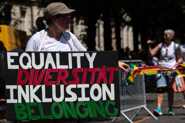 June 27, 2026, Munich, Bayern, Germany: People march through Munich s streets under the banner Our diversity. Our strength to advocate for LGBTQIA+ rights, despite high temperatures. Munich Germany  - ZUMAm309 20260627_zip_m309_012 Copyright: xJuliusxMortsix