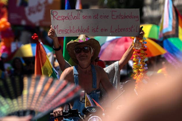 June 27, 2026, Munich, Bayern, Germany: People march through Munich s streets under the banner Our diversity. Our strength to advocate for LGBTQIA+ rights, despite high temperatures. Munich Germany  - ZUMAm309 20260627_zip_m309_031 Copyright: xJuliusxMortsix