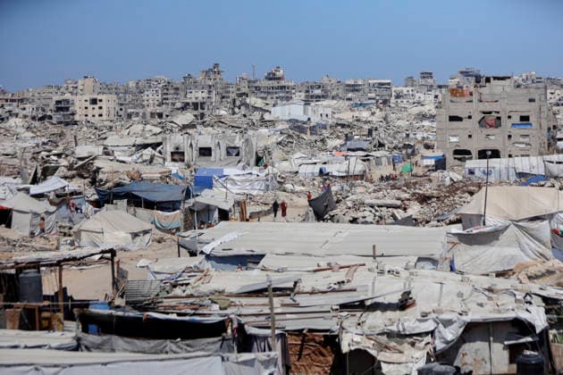 Jabalia Gaza Daily Life Destroyed buildings and piles of rubble cover a neighbourhood in Jabalia, northern Gaza on June 27, 2026. Residents remain among the ruins of damaged and destroyed buildings in Jabalia, where access to basic services such as water, electricity, and shelter remains severely limited. Gaza Gaza Strip Palestinian Territories Copyright: xAhmedxAlxArinix