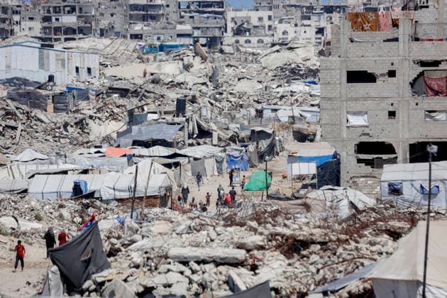 Jabalia Gaza Daily Life Destroyed buildings and piles of rubble cover a neighbourhood in Jabalia, northern Gaza on June 27, 2026. Residents remain among the ruins of damaged and destroyed buildings in Jabalia, where access to basic services such as water, electricity, and shelter remains severely limited. Gaza Gaza Strip Palestinian Territories Copyright: xAhmedxAlxArinix