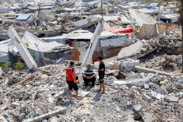 Jabalia Gaza Daily Life Palestinian residents sit among the rubble of destroyed buildings in Jabalia, northern Gaza Strip on June 27, 2026. Residents remain among the ruins of damaged and destroyed buildings in Jabalia, where access to basic services such as water, electricity, and shelter remains severely limited. Gaza Gaza Strip Palestinian Territories Copyright: xAhmedxAlxArinix