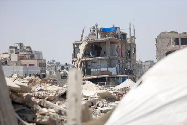 Jabalia Gaza Daily Life A heavily damaged building stands among rubble in Jabalia, northern Gaza Strip on June 27, 2026. Residents remain among the ruins of damaged and destroyed buildings in Jabalia, where access to basic services such as water, electricity, and shelter remains severely limited. Gaza Gaza Strip Palestinian Territories Copyright: xAhmedxAlxArinix