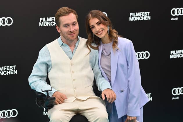 Entertainment Bilder des Tages Cathy HUMMELS FISCHER, Samuel KOCH. Eroeffnung 43.Filmfest Muenchen am 27.06.2026 Gasteig HP8. *** Cathy HUMMELS FISCHER, Samuel KOCH Opening of the 43rd Munich Film Festival on June 27, 2026, at Gasteig HP8