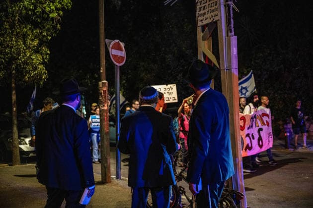 Anti-government protest held in West Jerusalem WEST JERUSALEM - JUNE 27: Dozens of Israelis gather to protest against Prime Minister Benjamin Netanyahu and the current government, calling for their resignation and early elections, in West Jerusalem on June 27, 2026. Demonstrators carry placards criticizing Israeli military operations and settlement policies, chant slogans against Netanyahu, and express opposition to what they describe as genocide in Gaza. Mostafa Alkharouf Anadolu Jerusalem Israel. Editorial use only. Please get in touch for any other usage.  Copyright: x2026xAnadoluxMostafaxAlkharoufx