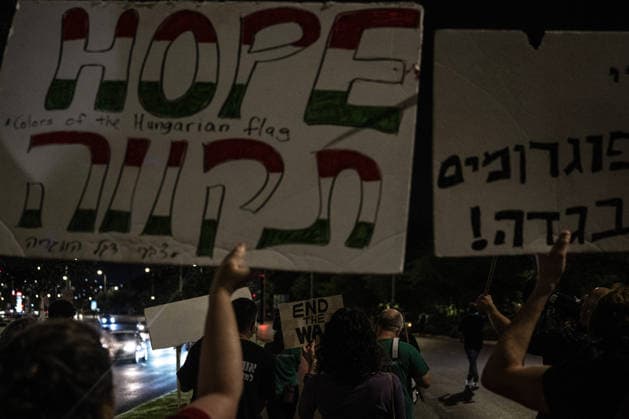 Anti-government protest held in West Jerusalem WEST JERUSALEM - JUNE 27: Dozens of Israelis gather to protest against Prime Minister Benjamin Netanyahu and the current government, calling for their resignation and early elections, in West Jerusalem on June 27, 2026. Demonstrators carry placards criticizing Israeli military operations and settlement policies, chant slogans against Netanyahu, and express opposition to what they describe as genocide in Gaza. Mostafa Alkharouf Anadolu Jerusalem Israel. Editorial use only. Please get in touch for any other usage.  Copyright: x2026xAnadoluxMostafaxAlkharoufx