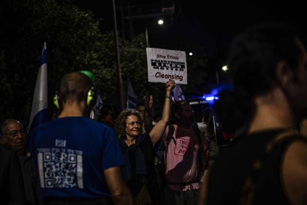 Anti-government protest held in West Jerusalem WEST JERUSALEM - JUNE 27: Dozens of Israelis gather to protest against Prime Minister Benjamin Netanyahu and the current government, calling for their resignation and early elections, in West Jerusalem on June 27, 2026. Demonstrators carry placards criticizing Israeli military operations and settlement policies, chant slogans against Netanyahu, and express opposition to what they describe as genocide in Gaza. Mostafa Alkharouf Anadolu Jerusalem Israel. Editorial use only. Please get in touch for any other usage.  Copyright: x2026xAnadoluxMostafaxAlkharoufx