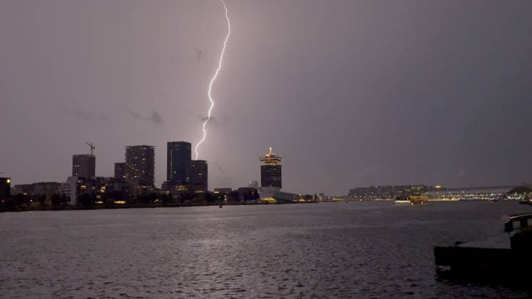 Amsterdam The Netherlands 26th June 2026 A spectacular electric storm passes over Het Ij waterway in the centre of the city making an end to the heatwave of the past week. het weer, weather, wetter, lightning, thunder, onweer,
