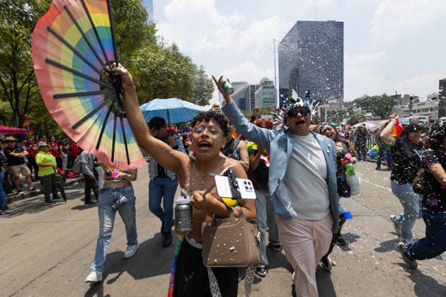 June 27, 2026, Mexico City, Mexico: Thousands of people took part in the 48th LGBTIQ+ Pride March in Mexico City, which marched from Paseo de la Reforma to the Zocalo under the slogan In the eyes of the world, my struggle is your struggle. Equality, peace and solidarity. Mexico City Mexico - ZUMAl178 20260627_znp_l178_033 Copyright: xCristianxLeyvax