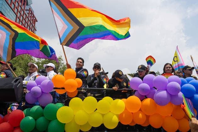 June 27, 2026, Mexico City, Mexico: Thousands of people took part in the 48th LGBTIQ+ Pride March in Mexico City, which marched from Paseo de la Reforma to the Zocalo under the slogan In the eyes of the world, my struggle is your struggle. Equality, peace and solidarity. Mexico City Mexico - ZUMAl178 20260627_znp_l178_040 Copyright: xCristianxLeyvax