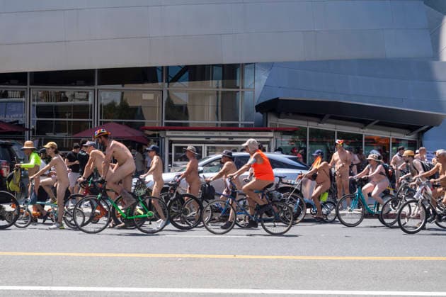 June 27, 2026, Los Angeles, California, United States: (EDITORS NOTE: Image contains nudity) .Nude cyclists ride past Walt Disney Concert Hall in Downtown Lo Angeles in the World Naked Bike Ride. Los Angeles United States - ZUMAs197 20260627_aaa_s197_063 Copyright: xRingoxChiux