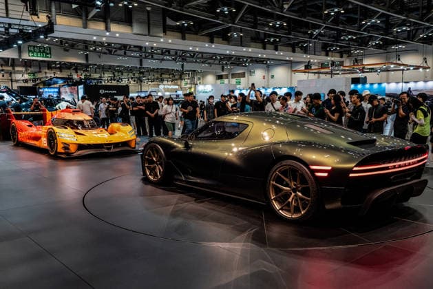 June 27, 2026, Busan, South Korea: People take photos of GMR(Genesis Magma Racing)-001 hyper car design model and Magma GT Concept during the Busan International Mobility Show 2026 (BIMOS 2026) at BEXCO. Busan International Mobility Show 2026 (BIMOS 2026) is happening from June 26 to July 5. Busan South Korea - ZUMAs197 20260627_aaa_s197_120 Copyright: xSimonxShinx
