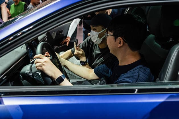 June 27, 2026, Busan, South Korea: People seen experiencing The All-New Avante CN8 during the Busan International Mobility Show 2026 (BIMOS 2026) at BEXCO. Busan International Mobility Show 2026 (BIMOS 2026) is happening from June 26 to July 5. Busan South Korea - ZUMAs197 20260627_aaa_s197_147 Copyright: xSimonxShinx