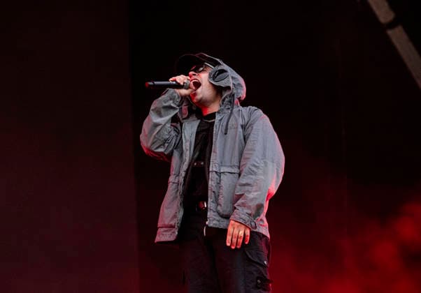 Kneecap performing live at Crystal Palace Park, London 27 June 2026 Kneecap performing live at Crystal Palace Park, London 27 June 2026 Moglai Bap (Naoise O Caireallai) - rapper, vocals Kneecap are an Irish hip-hop trio. They rap in a mixture of English and Irish. Their first single C.E.A.R.T.A. (cearta is Irish for rights ) was released in ˜17, followed by their mixtape, 3CAG, in ˜18. Their first studio album, Fine Art, was released in ˜24 Their second studio album, Fenian, was released in ˜26. The group has been at the centre of public debates about free speech and the expression of political opinions within Ireland and the UK. Their themes focus on working class, youth culture, Irish republicanism and Irish language rights  Copyright: xDafyddxOwenx xDafyddxOwenx-xB5377x xAvalonx 1112995629