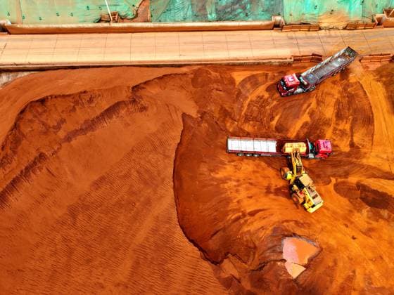 Qingdao Port Ore Terminal Construction machinery is sorting and loading imported iron ore at the Qingdao Port Ore Terminal in Qingdao, Shandong Province, China on June 28, 2026. Qingdao Shandong China  Copyright: xCFOTOx i1782655940638