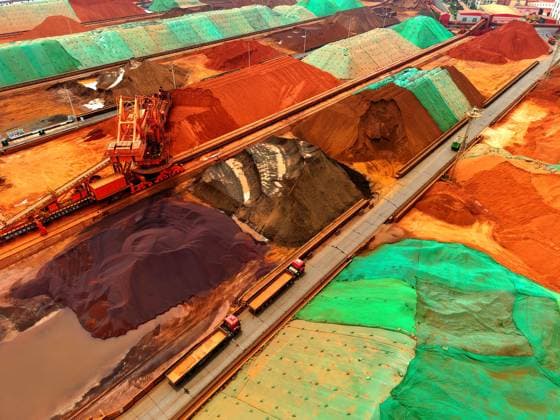 Qingdao Port Ore Terminal Construction machinery is sorting and loading imported iron ore at the Qingdao Port Ore Terminal in Qingdao, Shandong Province, China on June 28, 2026. Qingdao Shandong China  Copyright: xCFOTOx i1782655941151