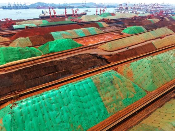 Qingdao Port Ore Terminal Construction machinery is sorting and loading imported iron ore at the Qingdao Port Ore Terminal in Qingdao, Shandong Province, China on June 28, 2026. Qingdao Shandong China  Copyright: xCFOTOx i1782655941436