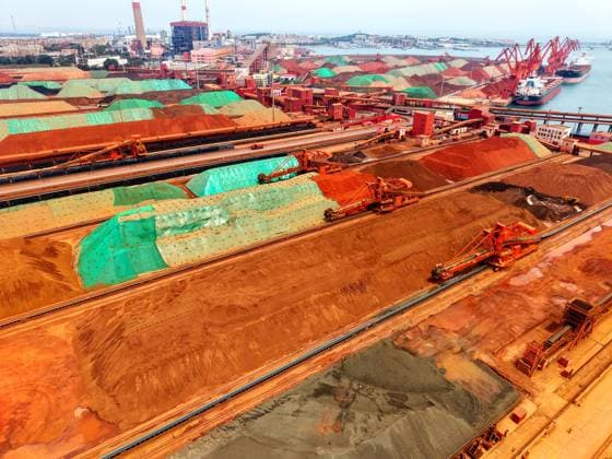 Qingdao Port Ore Terminal Construction machinery is sorting and loading imported iron ore at the Qingdao Port Ore Terminal in Qingdao, Shandong Province, China on June 28, 2026. Qingdao Shandong China  Copyright: xCFOTOx i1782655942630