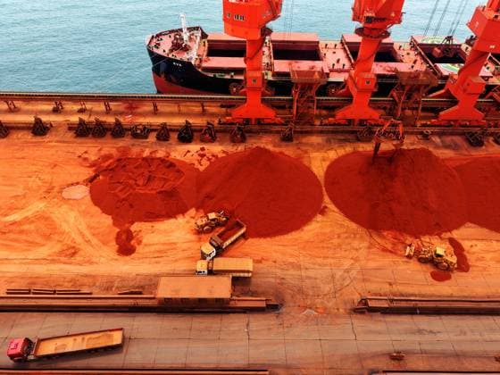 Qingdao Port Ore Terminal Construction machinery is sorting and loading imported iron ore at the Qingdao Port Ore Terminal in Qingdao, Shandong Province, China on June 28, 2026. Qingdao Shandong China  Copyright: xCFOTOx i1782655942925