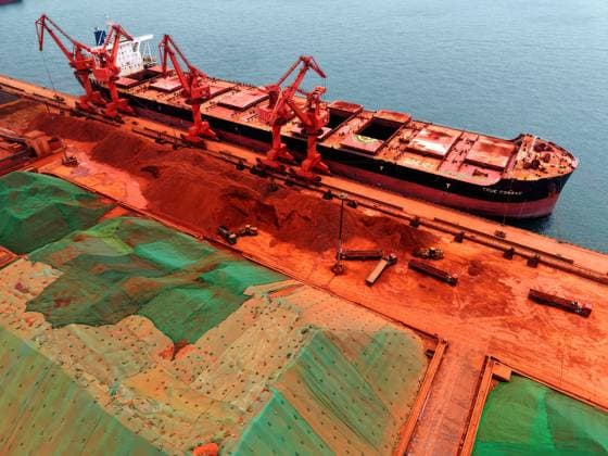 Qingdao Port Ore Terminal A cargo ship was unloading imported iron ore at the ore terminal of Qingdao Port, Qingdao City, Shandong Province, China on June 28, 2026. Qingdao Shandong China  Copyright: xCFOTOx i1782655943804