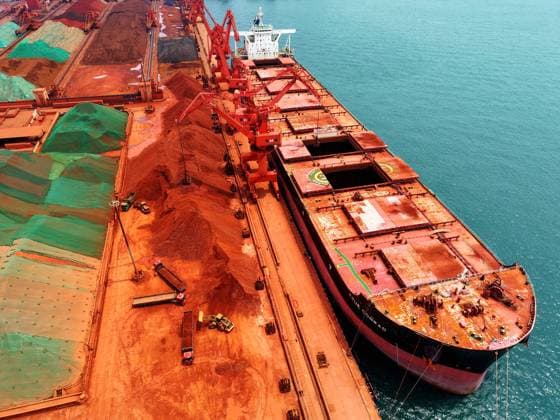 Qingdao Port Ore Terminal A cargo ship was unloading imported iron ore at the ore terminal of Qingdao Port, Qingdao City, Shandong Province, China on June 28, 2026. Qingdao Shandong China  Copyright: xCFOTOx i1782655943941