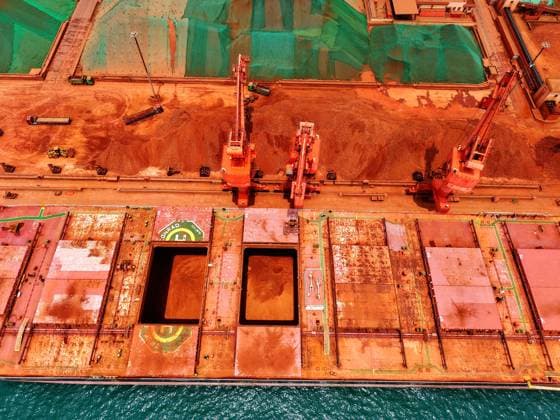 Qingdao Port Ore Terminal A cargo ship was unloading imported iron ore at the ore terminal of Qingdao Port, Qingdao City, Shandong Province, China on June 28, 2026. Qingdao Shandong China  Copyright: xCFOTOx i1782655944499