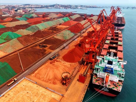 Qingdao Port Ore Terminal A cargo ship was unloading imported iron ore at the ore terminal of Qingdao Port, Qingdao City, Shandong Province, China on June 28, 2026. Qingdao Shandong China  Copyright: xCFOTOx i1782655944645