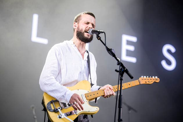 White Lies live at Tinderbox 2026 Odense, Denmark. 27th, June 2026. The English indie rock and post-punk band White Lies performs a live concert during the Danish music festival Tinderbox 2026 in Odense. Here singer and guitarist Harry McVeigh is seen live on stage. Denmark, Odense  Copyright: xGonzalesxPhoto LassexLagonix
