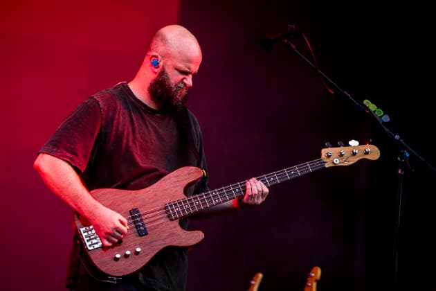 White Lies live at Tinderbox 2026 Odense, Denmark. 27th, June 2026. The English indie rock and post-punk band White Lies performs a live concert during the Danish music festival Tinderbox 2026 in Odense. Here bass player Charles Cave is seen live on stage. Denmark, Odense  Copyright: xGonzalesxPhoto LassexLagonix