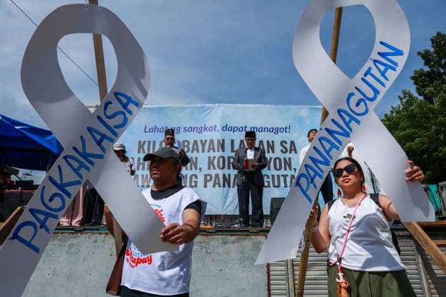 Anti-corruption rally in Philippines demands VP Sara Duterte s impeachment METRO MANILA, PHILIPPINES - JUNE 28: Participants hold white ribbon placards reading Pagkakaisa (Unity) and Pananagutan (Accountability) as religious leaders address an anti-corruption rally in Quezon City, Metro Manila, Philippines, on June 28, 2026. Organized by interfaith groups, including Muslim, Catholic and other Christian leaders, the rally drew thousands of people calling for better governance, electoral reforms, an end to corruption, and the impeachment of Vice President Sara Duterte, whose trial is scheduled to begin at the Senate on July 6. Daniel Ceng Anadolu Meto Manila Philippines. Editorial use only. Please get in touch for any other usage.  Copyright: x2026xAnadoluxDanielxCengx