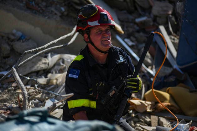 Members of Caracas firefighters search for victims amid debris of a demolished building after a magnitude 7.2 earthquake struck Venezuela and other regions in the Caribbean in La Guaira, Venezuela, on June 27, 2026. According to the U.S. Geological Survey, a powerful 7.5?magnitude aftershock struck after the main quake. Medical and media sources reported that the death toll has risen to around 1,500, with some 3,000 others injured. A web page created to track the missing has listed nearly 50,000 people as unaccounted for. photo by Jonathan Lanza  VAN2026062805 JonathanxLanza