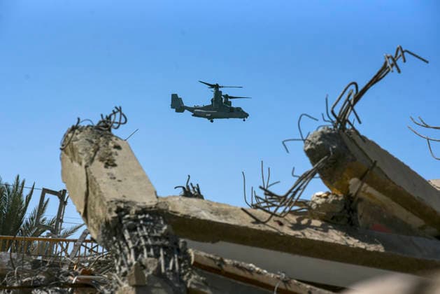A drone searches for survivors as rescue teams continue looking for victims amid debris of a demolished building after a magnitude 7.2 earthquake struck Venezuela and other regions in the Caribbean in La Guaira, Venezuela, on June 27, 2026. According to the U.S. Geological Survey, a powerful 7.5?magnitude aftershock struck after the main quake. Medical and media sources reported that the death toll has risen to around 1,500, with some 3,000 others injured. A web page created to track the missing has listed nearly 50,000 people as unaccounted for. photo by Jonathan Lanza  VAN2026062810 JonathanxLanza