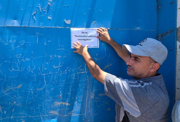 UNRWA employees stage protest over dismissal of 70 workers Employees of the United Nations Relief and Works Agency (UNRWA) take part in an open-ended sit-in outside the agency s industrial office in Khan Younis, southern Gaza Strip, on June 28, 2026, protesting a decision to dismiss 70 employees from their jobs. The protesters called on the agency s administration to reverse the decision, saying they would continue the sit-in until their demands are met. Photo by Tariq Mohammad APA Images Khan Yunis Gaza Strip Palestinian Territory 280626_Khan_Yunis_TM_01(7) Copyright: xapaimagesxTariqxMohammad xapaimagesx