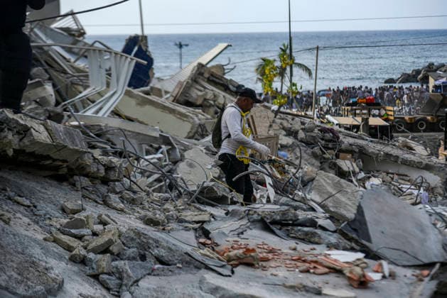 Rescue workers in Caracas continue searching for victims amid debris of a demolished building after a magnitude 7.2 earthquake struck Venezuela and other regions in the Caribbean in La Guaira, Venezuela, on June 27, 2026. According to the U.S. Geological Survey, a powerful 7.5?magnitude aftershock struck after the main quake. Medical and media sources reported that the death toll has risen to around 1,500, with some 3,000 others injured. A web page created to track the missing has listed nearly 50,000 people as unaccounted for.  VAN2026062823 JonathanxLanza