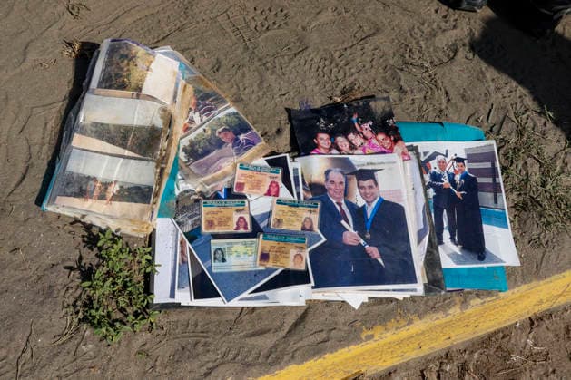 Photos and ID cards of victims still missing as rescue teams continue searching for victims amid debris of a demolished building after a magnitude 7.2 earthquake struck Venezuela and other regions in the Caribbean in La Guaira, Venezuela, on June 27, 2026. According to the U.S. Geological Survey, a powerful 7.5?magnitude aftershock struck after the main quake. Medical and media sources reported that the death toll has risen to around 1,500, with some 3,000 others injured. A web page created to track the missing has listed nearly 50,000 people as unaccounted for.  VAN2026062825 JonathanxLanza
