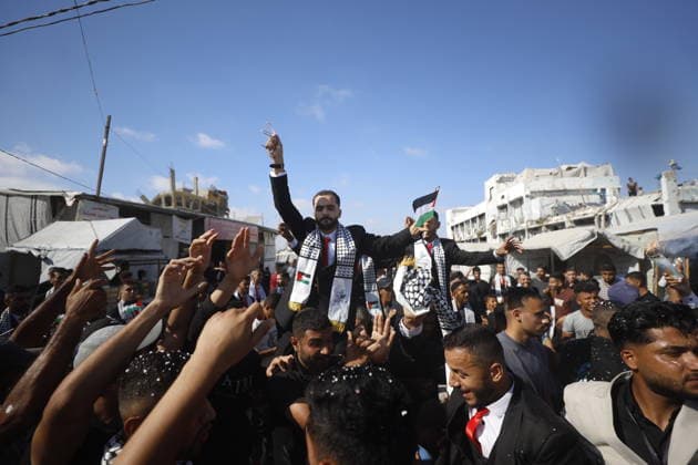 150 Palestinian couples tie the knot in mass wedding at Jabalia Camp GAZA, PALESTINE - JUNE 28: Newlyweds celebrate as 150 Palestinian couples tie the knot in a mass wedding ceremony organized by a charity organization at the Jabalia Refugee Camp in the northern Gaza Strip, Gaza, Palestine on June 28, 2026. The young couples advanced towards the wedding hall accompanied by traditional songs and dances. Ahmed Jihad Ibrahim Al-arini Anadolu Gaza City Gaza. Editorial use only. Please get in touch for any other usage.  Copyright: x2026xAnadoluxAhmedxJihadxIbrahimxAl-arinix