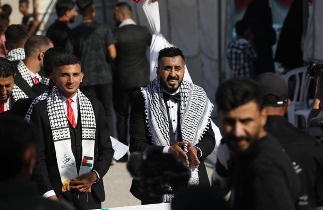 Mass Wedding Ceremony Brings Together 150 Couples in Northern Gaza Palestinian brides and grooms take part in a mass wedding ceremony in Jabalia, northern Gaza Strip, on June 28, 2026. The event was organized by the Ghouth Charitable Foundation as part of a social initiative to support the marriage of 150 couples from northern Gaza, months after the area suffered extensive destruction during the war. Photo by Bilal Osama apaimages Gaza city Gaza Strip Palestinian Territory 280626_Jabalia_BO_00(19) Copyright: xapaimagesxBilalxOsamax xapaimagesx