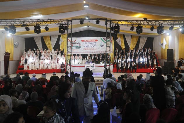 Mass Wedding Ceremony Brings Together 150 Couples in Northern Gaza Palestinian brides and grooms take part in a mass wedding ceremony in Jabalia, northern Gaza Strip, on June 28, 2026. The event was organized by the Ghouth Charitable Foundation as part of a social initiative to support the marriage of 150 couples from northern Gaza, months after the area suffered extensive destruction during the war. Photo by Bilal Osama apaimages Gaza city Gaza Strip Palestinian Territory 280626_Jabalia_BO_00(45) Copyright: xapaimagesxBilalxOsamax xapaimagesx
