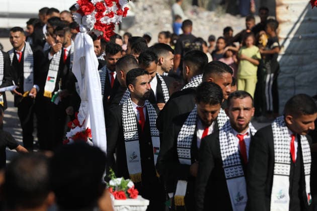 Mass Wedding Ceremony Brings Together 150 Couples in Northern Gaza Palestinian brides and grooms take part in a mass wedding ceremony in Jabalia, northern Gaza Strip, on June 28, 2026. The event was organized by the Ghouth Charitable Foundation as part of a social initiative to support the marriage of 150 couples from northern Gaza, months after the area suffered extensive destruction during the war. Photo by Bilal Osama apaimages Gaza city Gaza Strip Palestinian Territory 280626_Jabalia_BO_00(21) Copyright: xapaimagesxBilalxOsamax xapaimagesx