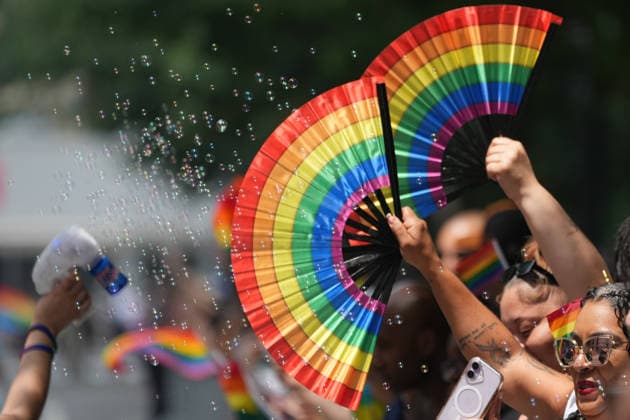 June 28, 2026, New Yok, New York, USA: People wave rainbow fans at the Annual NYC Pride March on June 28, 2026 in New York. NYC s Pride March began as a demonstration honoring the 1969 Stonewall Riots, has evolved into a global symbol of LGBTQIA+ resilience, unity and activism. New Yok USA  - ZUMAb148 20260628_zap_b148_007 Copyright: xBryanxSmithx