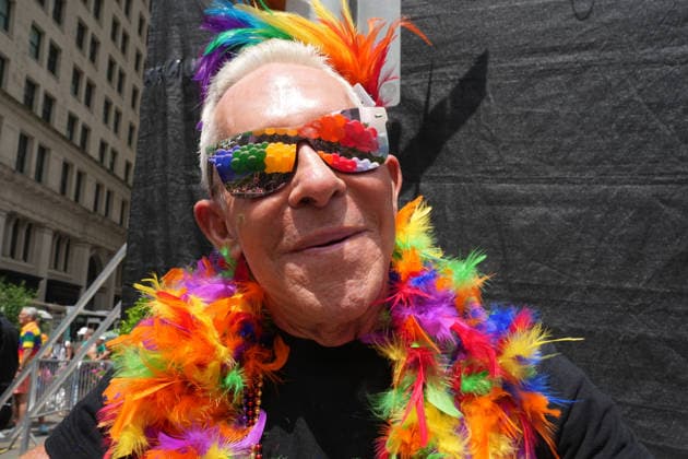 June 28, 2026, New Yok, New York, USA: A man dressed in rainbow colors watches the Annual NYC Pride March on June 28, 2026 in New York. NYC s Pride March began as a demonstration honoring the 1969 Stonewall Riots, has evolved into a global symbol of LGBTQIA+ resilience, unity and activism. New Yok USA  - ZUMAb148 20260628_zap_b148_010 Copyright: xBryanxSmithx