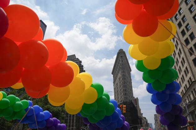 June 28, 2026, New Yok, New York, USA: Volunteers carry rainbow balloons past the Flatiron Building at the Annual NYC Pride March on June 28, 2026 in New York. NYC s Pride March began as a demonstration honoring the 1969 Stonewall Riots, has evolved into a global symbol of LGBTQIA+ resilience, unity and activism. New Yok USA - ZUMAb148 20260628_zap_b148_009 Copyright: xBryanxSmithx