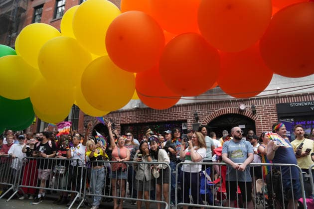 June 28, 2026, New Yok, New York, USA: Volunteers carry rainbow balloons past the Stonewall Inn at the Annual NYC Pride March on June 28, 2026 in New York. NYC s Pride March began as a demonstration honoring the 1969 Stonewall Riots, has evolved into a global symbol of LGBTQIA+ resilience, unity and activism. New Yok USA  - ZUMAb148 20260628_zap_b148_022 Copyright: xBryanxSmithx