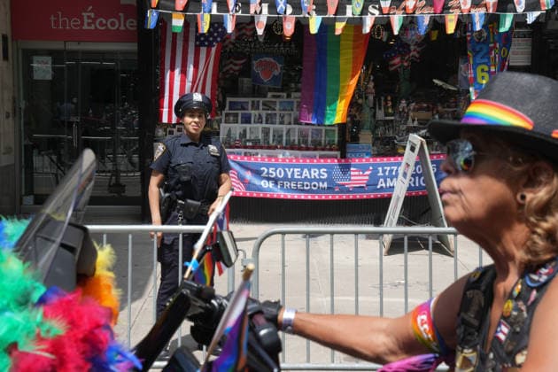 June 28, 2026, New Yok, New York, USA: A member of the Sirens NYC rides a motorcycle down Fifth Avenue past a store celebrating America s 250th Anniversary at the Annual NYC Pride March on June 28, 2026 in New York. NYC s Pride March began as a demonstration honoring the 1969 Stonewall Riots, has evolved into a global symbol of LGBTQIA+ resilience, unity and activism. New Yok USA  - ZUMAb148 20260628_zap_b148_026 Copyright: xBryanxSmithx