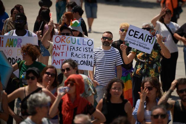 June 28, 2026, Pamplona, Spain: Protesters from the CEAR (Spanish Commission for Refugee Aid) collective, hold placards during the Gay Pride march. Hundreds of people participated in the demonstration held to mark International LGBTI+ Pride Day. The main focus of the demonstration was the discrimination against the refugee community, and of course, respect from institutions, while some feminist groups are excluding transgender people. Pamplona Spain  - ZUMAs197 20260628_aaa_s197_070 Copyright: xElsaxAxBravox