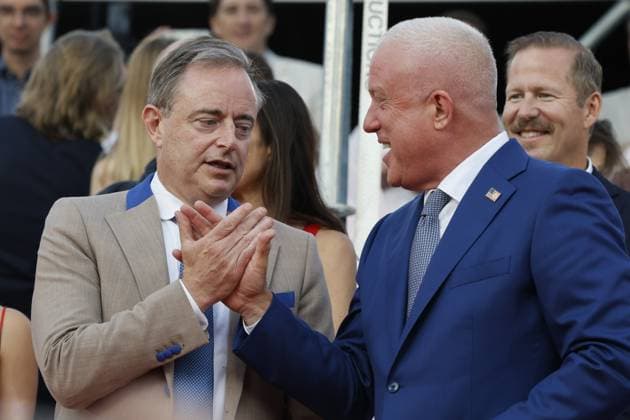 Prime Minister Bart De Wever and US ambassador to Belgium Bill White pictured during a celebration of the 250th anniversary of the U.S. Declaration of Independence, organized by the U.S. Embassy at the Jubelpark - Parc du Cinquantenaire park in Brussels on .  NICOLASxMAETERLINCK 179754026