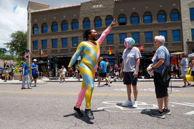 June 28, 2026, St. Petersburg, Florida, USA: Josiah Bangs, a performer, dances and interacts with festival goers during the St. Pete Pride Grand Central Street Fair at the Grand Central District on Sunday, June 28, 2026, in St. Petersburg. St. Petersburg USA - ZUMAs70_ 20260628_zan_s70_018 Copyright: xJeffereexWoox