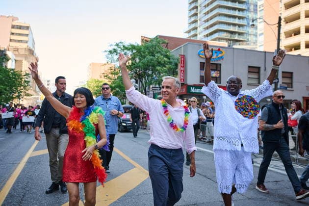 June 28, 2026, Toronto, On, Canada: Toronto Mayor Olivia Chow, left to right, Prime Minister Mark Carney and Executive Director of Toronto Pride Kojo Modeste take part in the Toronto Pride Parade on Sunday, June 28, 2026. Toronto Canada  - ZUMAc35_ 20260628_zaf_c35_030 Copyright: xSammyxKoganx