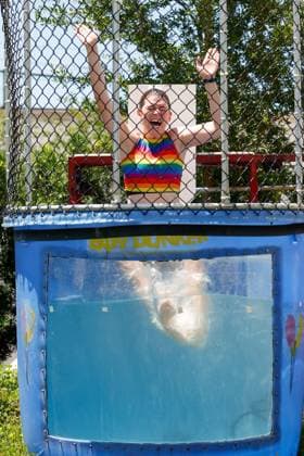 June 28, 2026, St. Petersburg, Florida, USA: Emily Stewart, a CASA volunteer manager, gets wet in a dunk tank during the St. Pete Pride Grand Central Street Fair at the Grand Central District on Sunday, June 28, 2026, in St. Petersburg. St. Petersburg USA - ZUMAs70_ 20260628_zan_s70_023 Copyright: xJeffereexWoox
